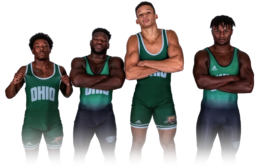 A group of student-athlete wrestlers posing